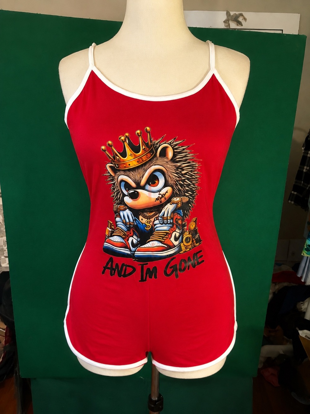 Red Sleeveless Graphic Romper with Crowned Hedgehog Print